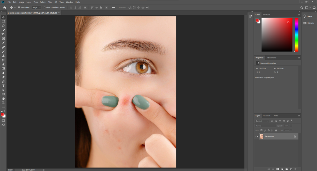 Open Photoshop and zoom into the area you want to fix