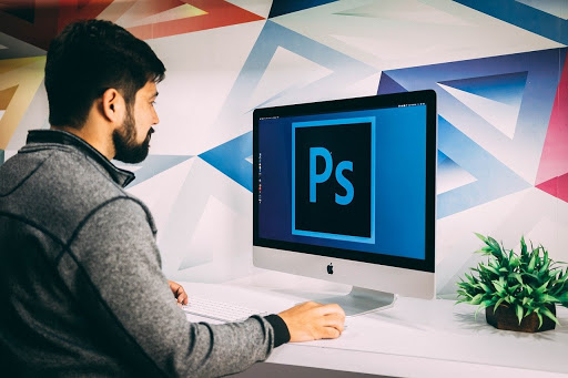 A Man In Front of Computer Do Editing Masking with Photoshop