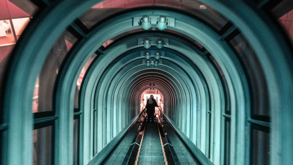 Person on Gray Concrete Road