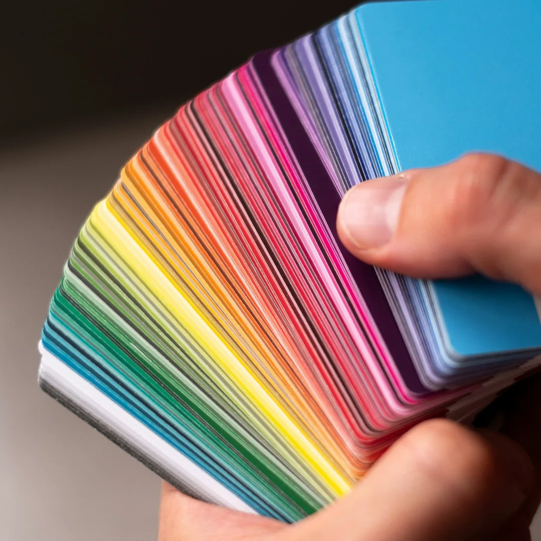 A stack of paper card with different color in "Selective Color Replacement in Photo Editing" article in Dropicts.com website